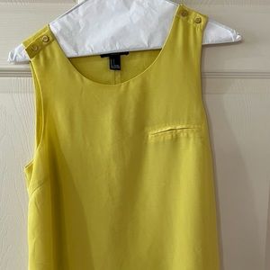 Woman’s yellow blouse with gold detail size small